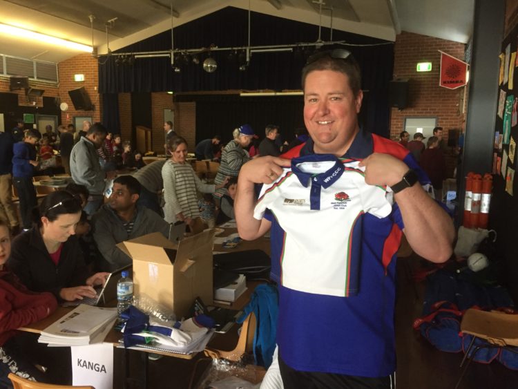 Bill Peterkin hopefully trying to see if a Kanga shirt fits - Registration Day 2015/16 - Oakhill Drive Public School - 26 July 2015.