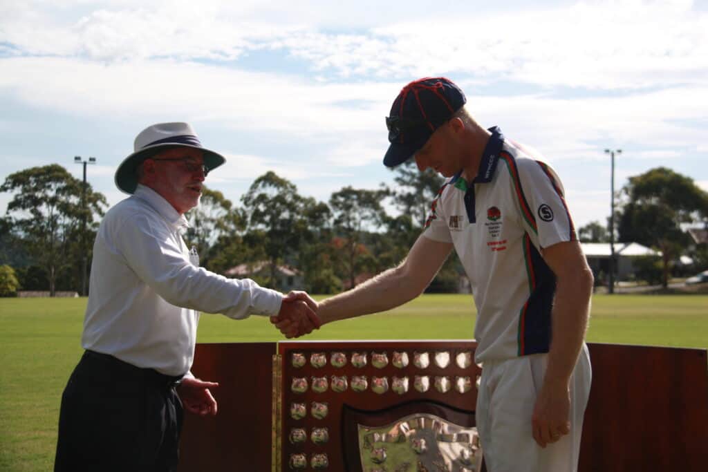 James Makin Receiving Trophy From Geoff Hasler Scaled 1.jpg