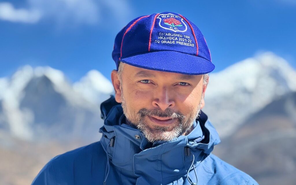 West Penno Colours Around the World - Mt Everest - Nirav Desai wearing his D1 Blue Premiership cap @ Everest Base Station - 20222023