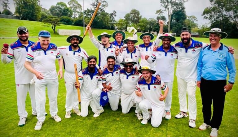 D1 Blue - Semi Final - Left to right: Niranjan Suruliappan, Roger Friend (C), Mahesh Shinde, David Tanna, Sandeep Pathak, Navneet Singh, Mahesh Kadaganchi, Malinda Dharmadasa, Tej Randhawa, Umpire Adam Hawken, Seated: - Vinoth Sambasivam, Bala Raghuraman, Shehan Fernando, Daniel McEwen Vs St Ives @ Campbell Park - 07032026