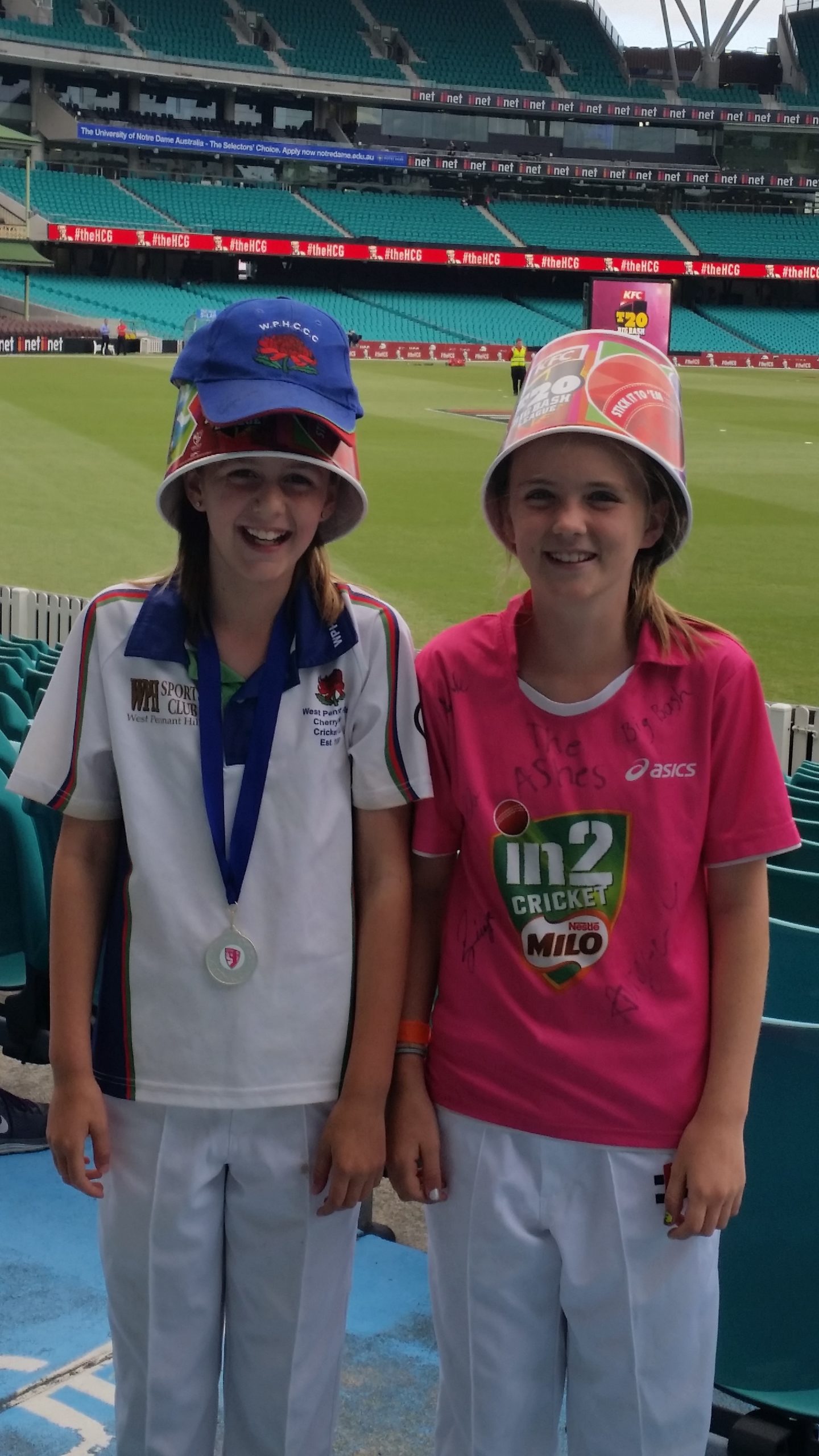 Danielle Chivers(Girls U12 White) & Ellen Hall at the SCG before the Sixers Big Bash 19 December 2014. The girls were at the SCG to be presented with their Premiership medallions for winning the inaugural U15 Division 1 Junior Breakers Junior Cricket League run.