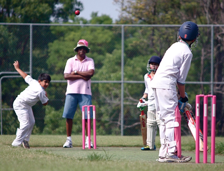 Close to the action at Glenhaven Oval with Umpire Radesh looking perfect in pink.